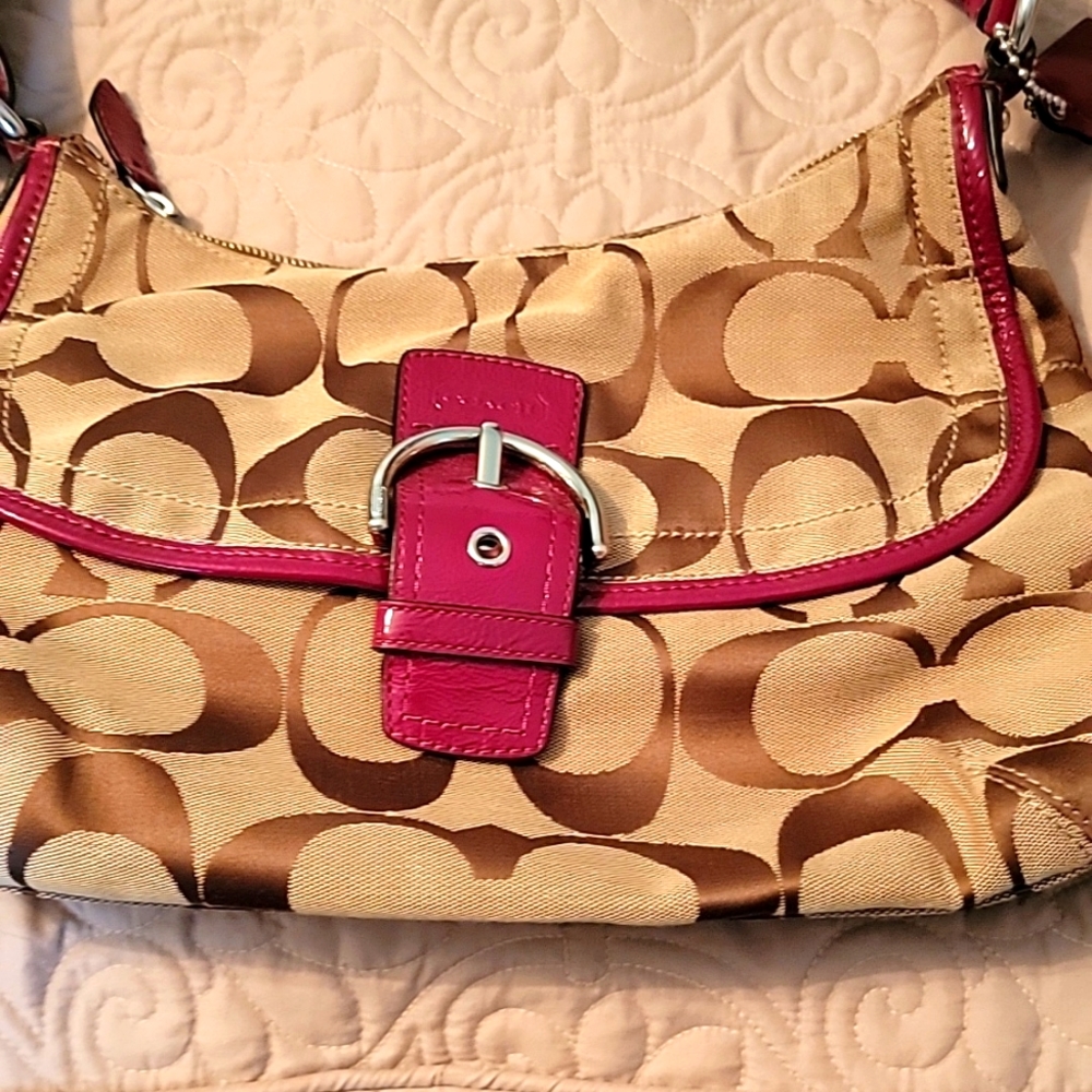 Coach tan shoulder bag with red accents